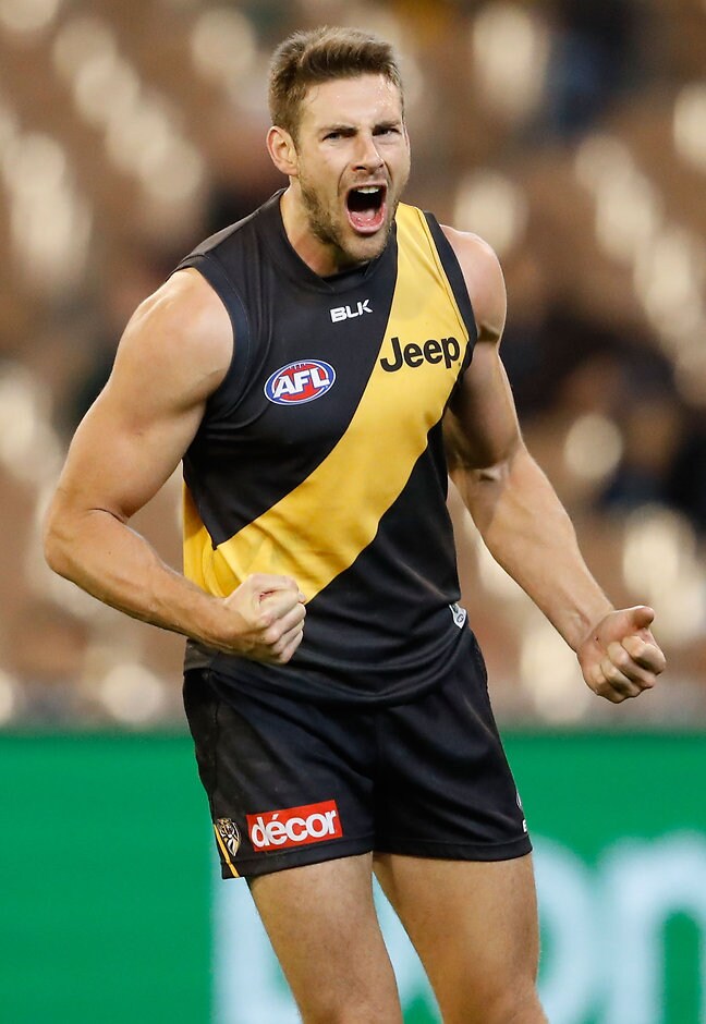 AFL 2016 Rd 12 - Richmond v Gold Coast MELBOURNE, AUSTRALIA - JUNE 12: Shaun Hampson of the Tigers celebrates a goal during the 2016 AFL Round 12 match between the Richmond Tigers and the Gold Coast Suns at the Melbourne Cricket Ground on June 12, 2016 in Melbourne, Australia. (Photo by Adam Trafford/AFL Media)